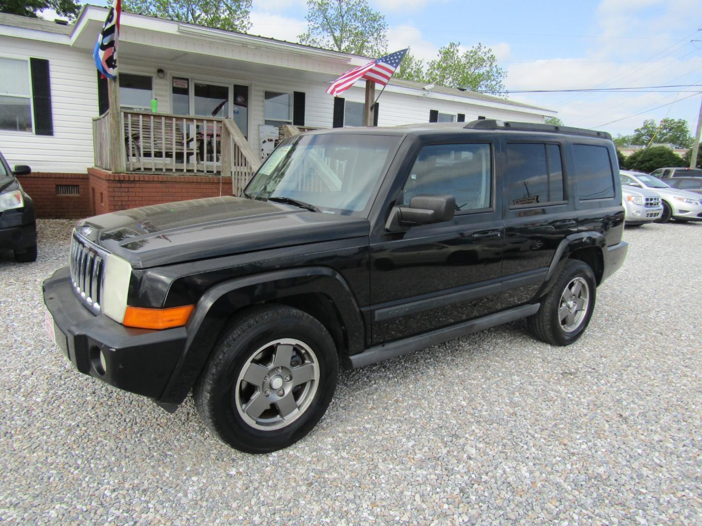 2007 Black /Gray Jeep Commander Sport 2WD (1J8HH48P37C) with an 4.7L V8 SOHC 16V FFV engine, Automatic transmission, located at 15016 S Hwy 231, Midland City, AL, 36350, (334) 983-3001, 31.306210, -85.495277 - Photo#2